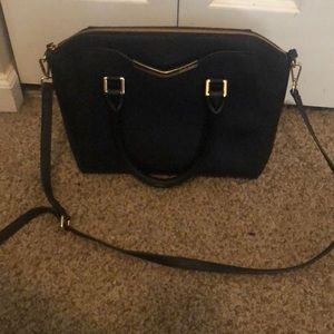 Black and gold Calvin Kline bag